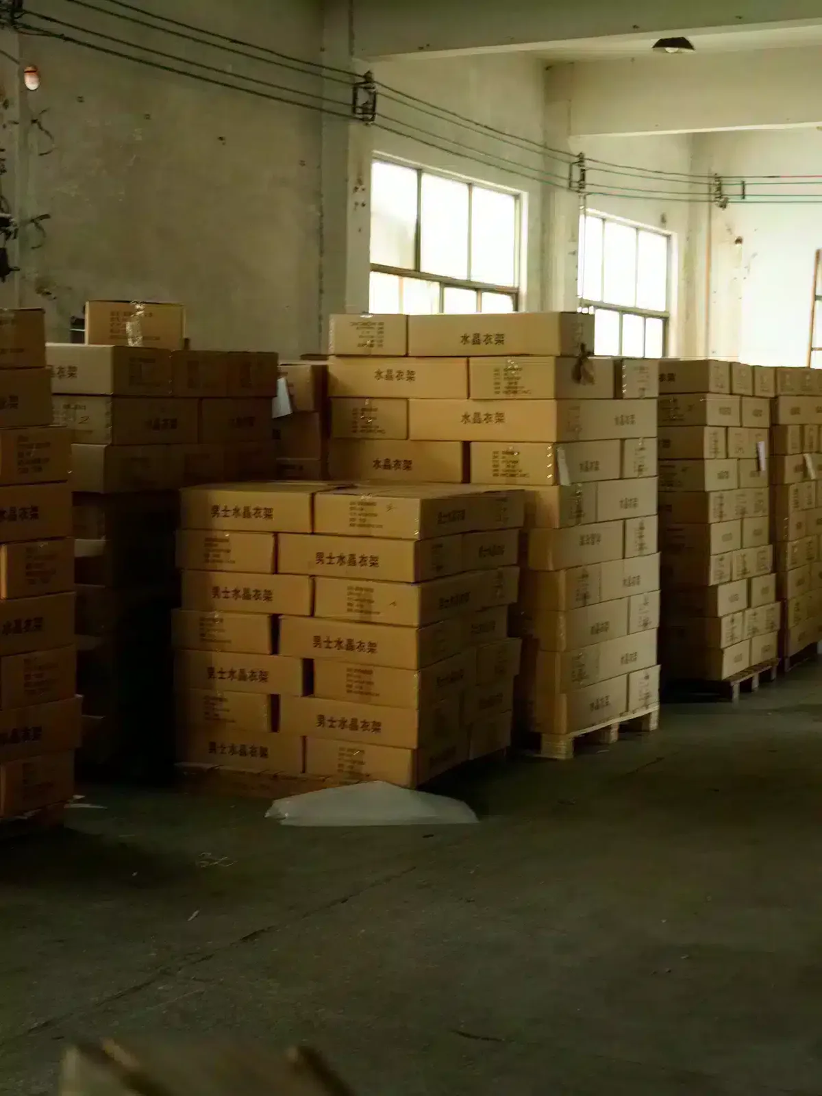 Stock area with packaged hangers at the Fanan Display factory