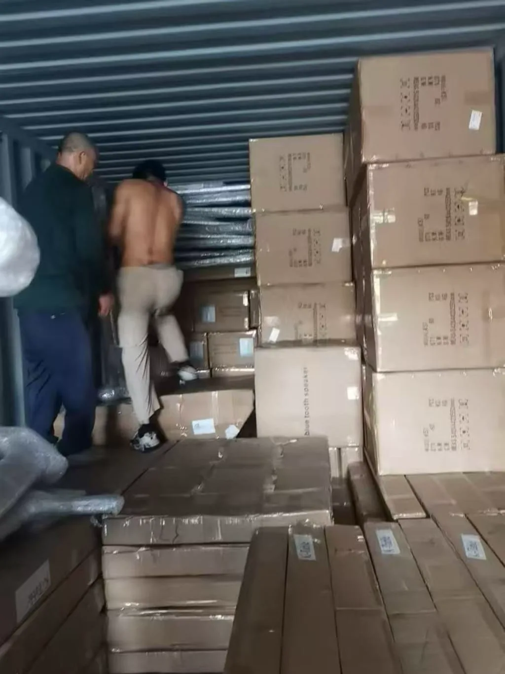 Finished hangers being loaded into a shipping container at Fanan Display