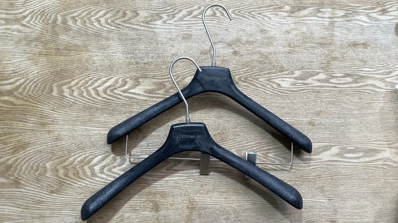 Fanan Display: Custom Black Resin Hangers for Hangzhou Retail Project